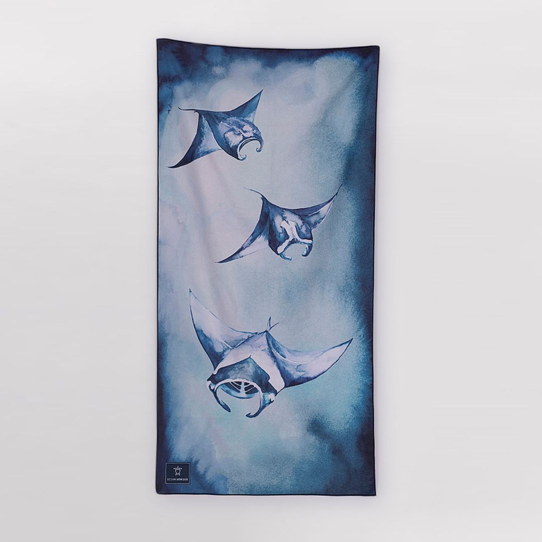 Oversized Manta Ray beach towel featuring watercolor ocean artwork